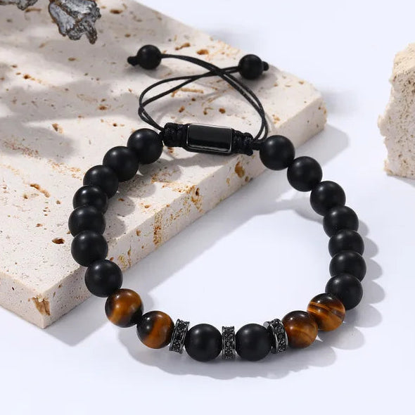 Férfi ásvány karkötő matt fekete ónix és tigrisszem gyöngyökkel, állítható zsinórral és cirkónia díszítéssel.