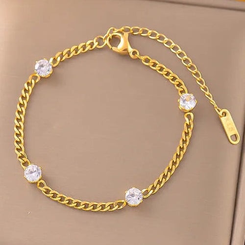 JULIA arany színű minimalista karkötő strassz medálokkal